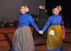 Madelyn Carson, freshman music education major, and Sara-Lane Baskin, senior art major, perform as Shaker women in the Fall play, As It Is In Heaven.  - Photo by Victoria Stargel