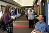 Shea Wingate, freshman, talks with Michael Salazar, associate professor of chemistry, during Career U, hosted by Career Services.  - Photo by Deanna Santangelo