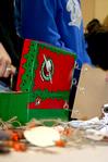 Students and faculty help pack Operation Christmas Child boxes for children in need during Campus and Community Day. - Photo by Deanna Santangelo