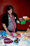 Ashley Jackson, resident director, packs a box for a child with Operation Christmas Child, which was one of many projects during Campus and Community Day. - Photo by Deanna Santangelo