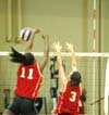 Union juniors Gladys Wandera (11) and Nicole Garber (3) block a Lee Univ. shot. - Photo by Steven Aldridge