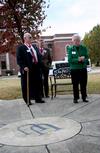 Ramona Mercer, volunteer tour guide and alum 1952, talks to the class of 1961 about the Union University circle in the old downtown Jackson campus. - Photo by Deanna Santangelo