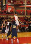 Stan McNeil jumps over his Truett-McConnell College opponents to score in the homecoming game.  - Photo by Victoria Stargel