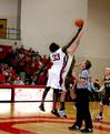 Zeinab "Sarah" Chan hits the ball into Union's possession at the beginning of the homecoming game against University of St. Francis. The Lady Bulldogs won the game 83-57.  - Photo by Deanna Santangelo