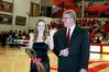 Ashley Smith, freshman business administration major, is escorted by her father, Tim Smith, dean of the School of Nursing, during the presentation of the homecoming court.  - Photo by Deanna Santangelo