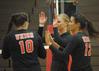 Union players celebrate after a point. Shelby Swink (10), Emmie Moroski (middle), Marcela Madeira (12). - Photo by Morris Abernathy