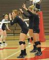 The Lady Bulldog volleyball team stands ready for play to begin.  - Photo by Morris Abernathy