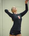 Emmie Moroski serves the ball. - Photo by Morris Abernathy