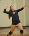 Jami Humphries serves the ball. - Photo by Morris Abernathy