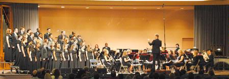 Symphonic Band, Proclamation and Madison Academic High School's "First Class" chorus, perform "Gloria" from the Heiligmesse and Strike Up the Band during the Fall concert, conducted by Chris Mathews. 