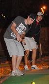 Ryan Substad, freshman engineering major, putts for the last hole at the men's Residence Life event, Puttapalooza. - Photo by Victoria Stargel