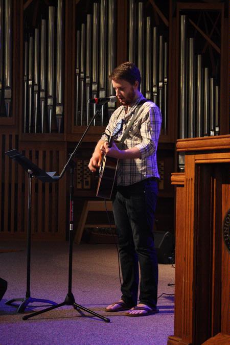T.J. Hester, junior philosophy major, leads Union students in song during chapel. 
