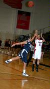 LaTesa McLaughlin shoots a three-pointer during the game against Vanguard University in the 17th Annual Jackson Rotary Classic. - Photo by Deanna Santangelo