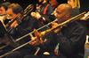 Guest performer James Henning plays trombone with Union's Jazz Band as they perform a variety of musical selections, involving the audience in several pieces.  - Photo by Victoria Stargel