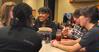 The Student Activities Council sponsors the annual Carl Perkins Christmas Party. Union students Taneka Reynolds, Tyler Strong, and Claudia Velasco get to know the child they sponsored. - Photo by Victoria Stargel
