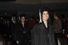 Katie Shatzer, journalism graduate, walks to her seat at the beginning of the 2010 Fall Commencement Services. 
 - Photo by Beth Spain