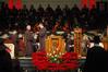 David S. Dockery, president of the university, congratulates students as he hands them their diploma during the 2010 Fall Commencement Services.  - Photo by Beth Spain