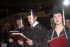 Graduates Mary Annis, Jordan Buie, and Sara Chinery, sing the Alma Mater at the close of the 2010 Fall Commencement Ceremonies.  - Photo by Beth Spain
