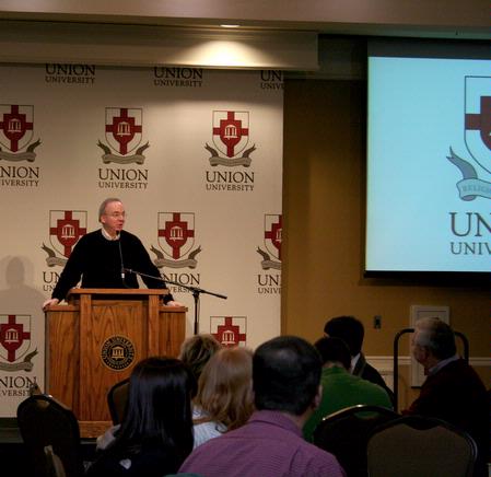 David Dockery, president of the university, greets prospective students at the beginning of a preview day.