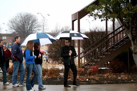 Justin Daughrity, junior Christian studies major, leads a group of prospective students around Union's campus during a preview day.
