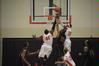 The Bulldogs battle for the ball against Bethel University. The Bulldogs won the game 77-75. - Photo by Morris Abernathy