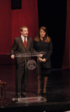 SGA President Keelan Cook and Senior Class President Laurie Skinkle present the invocation at the 2003 Scholarship Banquet featuring former New York City Mayor Rudolph Giuliani. - Photo by Jim Veneman