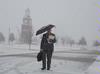 Dr. Randall Bush, professor of Christian thought & tradition, makes his way to class during a heavy snowfall. - Photo by Morris Abernathy