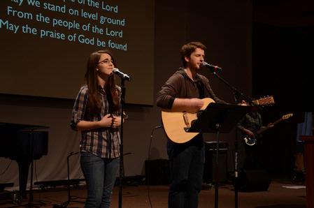 TJ Hester, junior philosophy major, and the worship band lead students during chapel.