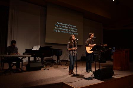TJ Hester, junior philosophy major, and the worship band lead students during chapel. 