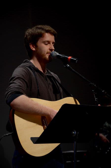 TJ Hester, junior philosophy major, leads students during chapel.