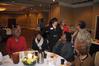 Guests of the 4th Annual Black History Month program fellowship together before hearing Renita J. Weems speak.   - Photo by Morris Abernathy