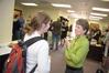 Susan Booth, missionary in residence, talks with a student at the reception held in the Booths' honor.  - Photo by Morris Abernathy