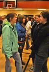 Beth Williams, senior special education major, and Rebecca Eaton, senior mathematics major, catch up at the the annual Holla Back party.  - Photo by Victoria Stargel