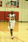 Zach Wiggs, a senior guard for the Bulldogs, brings the ball up the court during Union's season opener versus Williams Baptist. - Photo by Courtney Ross