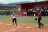 Ali Bozza, junior athletic training major, runs to first after batting for the Lady Bulldogs. The team won both games in a double header against Christian Brothers University.  - Photo by Victoria Stargel