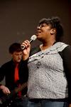 Cheraka McIntosh, sophomore nursing major, sings at the beginning of chapel. - Photo by Deanna Santangelo