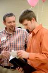 John Windham, director of recruitment, talks with a Scholar of Excellence perspective student during the welcome event in the Bowld Student Commons. - Photo by Deanna Santangelo