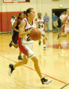 Peggy McCain (21), a sophomore guard for Union, hurries the ball down the floor.  Union players Monica Elliot (24) and Molly York (34) follow.  - Photo by Courtney Ross