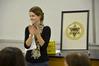 Kate Cline, senior history major and president of the Phi Alpha Theta chapter at Union, welcomes new members after their induction.  - Photo by Abigail Harris