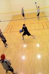 Students play intramural wall ball in the racquetball courts.  - Photo by Beth Spain