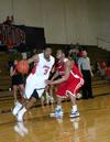 CJ Davis runs the ball down the court during the game against Lyon College. - Photo by Deanna Santangelo
