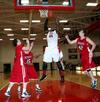 Shane Burrell grabs a rebound during the game against Lyon College. - Photo by Deanna Santangelo