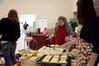 Megan Bailey, junior intercultural studies major, helps make food during the President's Day welcome back breakfast.  - Photo by Abigail Harris