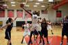Beatrice Awino Duol grabs a rebound during the game against Lyon College. - Photo by Beth Spain