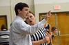 Mark Campbell, head women's basketball coach, discusses a call with the referee during a game against Lyon College, which the Lady Bulldogs won 65-44. - Photo by Beth Spain