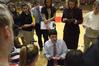 Mark Campbell, head women's basketball coach, gives an encouraging talk to the players. - Photo by Beth Spain