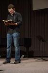 Mike Cosper, worship arts pastor for Sojourn Community Church in Louisville, Kentucky, reads from the book of Esther during chapel. - Photo by Abigail Harris