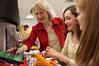 Jeanette Russ, professor of engineering, helps her students with circuits.  - Photo by Kristi McMurry