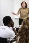 Students listen as Janna Chance, assistant professor of English, discusses a William Blake poem with them. - Photo by Kristi McMurry