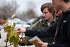 Micah Fern, senior conservation biology major, looks at the leaves of a magnolia tree during a field trip to the West TN Research & Education Center.  - Photo by Kristi McMurry